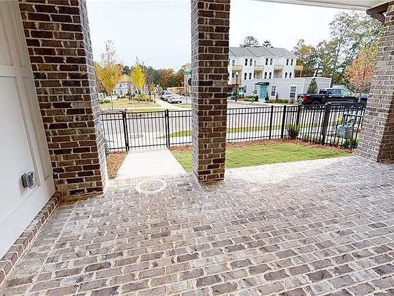 Benton I covered Patio with fenced in courtyard Not actual unit