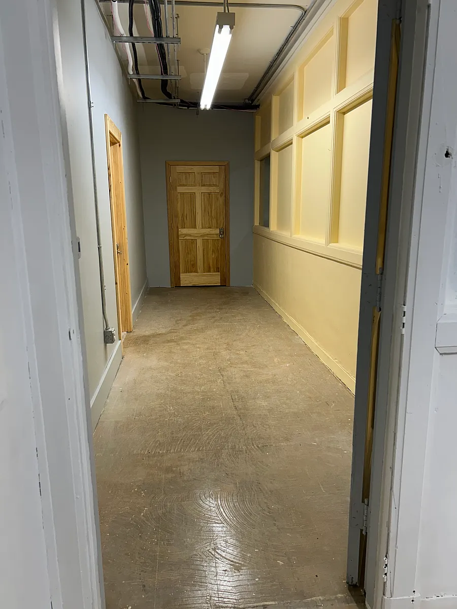 The hallway leading to the apartment - 11 4th Ave SW #1