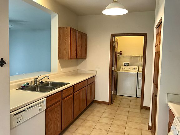 Kitchen opens to family room, convenient main level laundry.