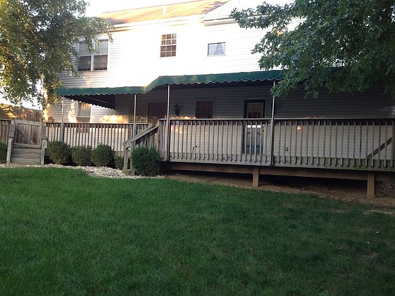 Oversized deck with awning