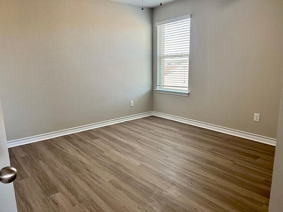 Front bedroom is perfect for an office, bedroom or extra living space! Has a very large closet!