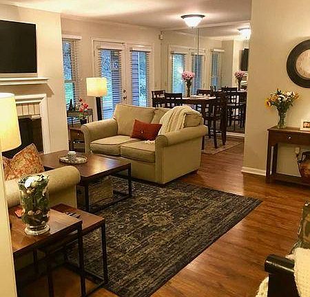 LIVING ROOFORM BEADROOM HALL. DINING ROOM IN DISTANCE.