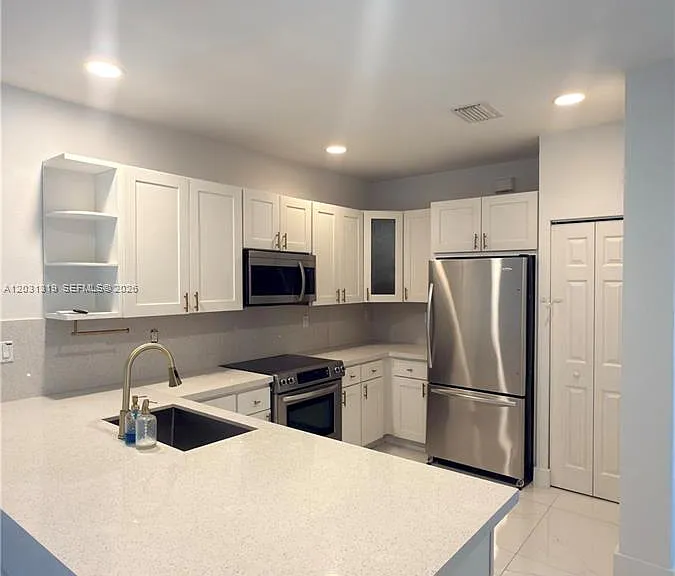 10737 NW 76th Ln — Photo 7