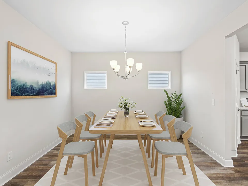 Elegant dining room featuring a rich wooden table and timeless seatingdesigned for unforgettable family gatherings.