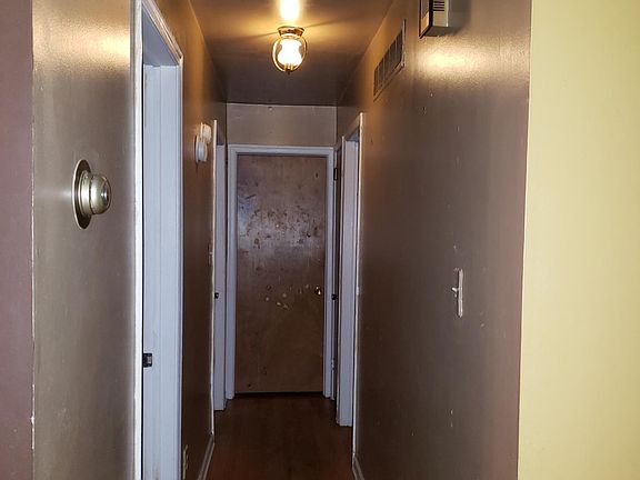 All bedrooms and bathrooms conveniently located on one side of the house, providing privacy from the living and kitchen area