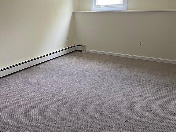 Bedroom with new carpeting