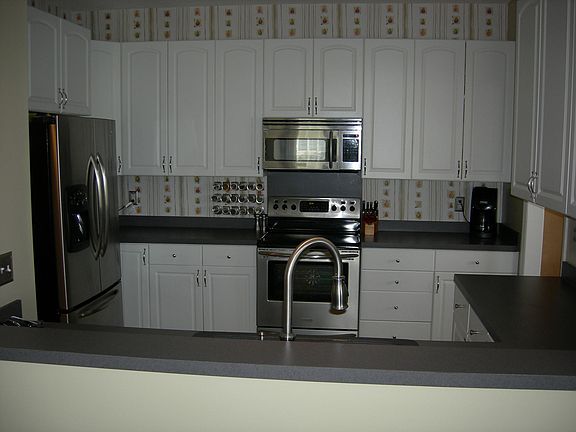 Totally redone kitchen with porcelain tile floors