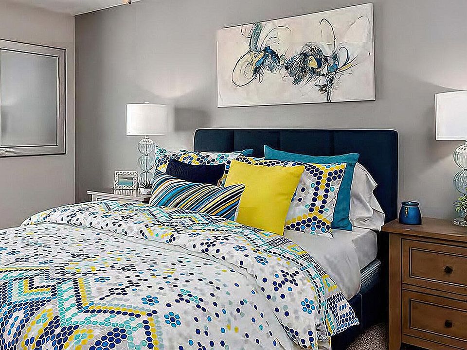 Brighten up your day in this colorful and cozy bedroom retreat.
