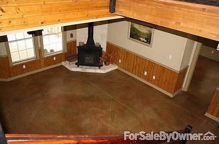 Living Room
						:
						View of living room from stairs. Enjoy the open concept living area
