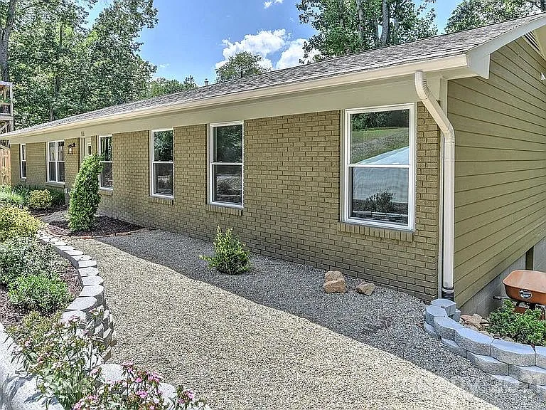 View of the home from the front corner. Xeriscaping across the property means minimal maintenance.