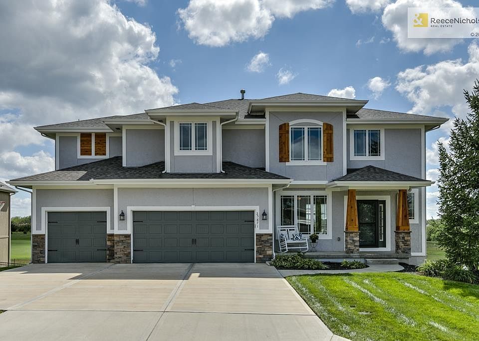 Flat Driveway into your 3 Car TANDEM Garage (Room for 4 Cars)