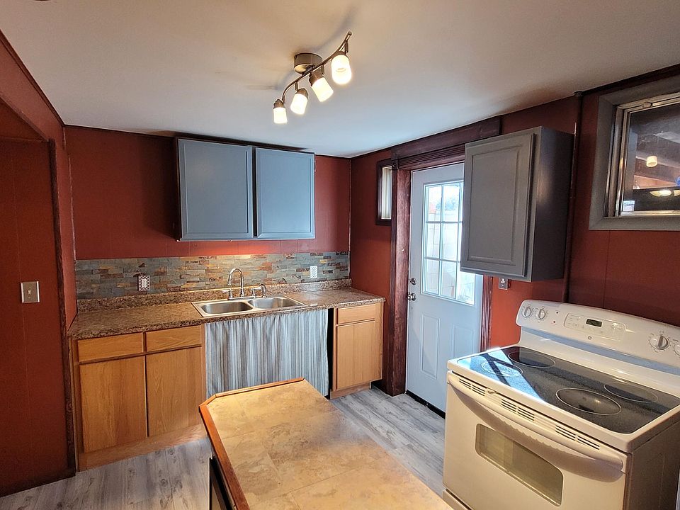 Newly remodeled kitchen with walkout to back yard.