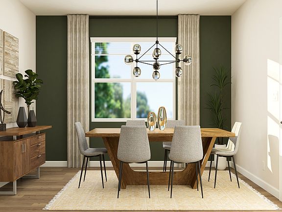 The spacious dining room is ready for all your dinner parties!