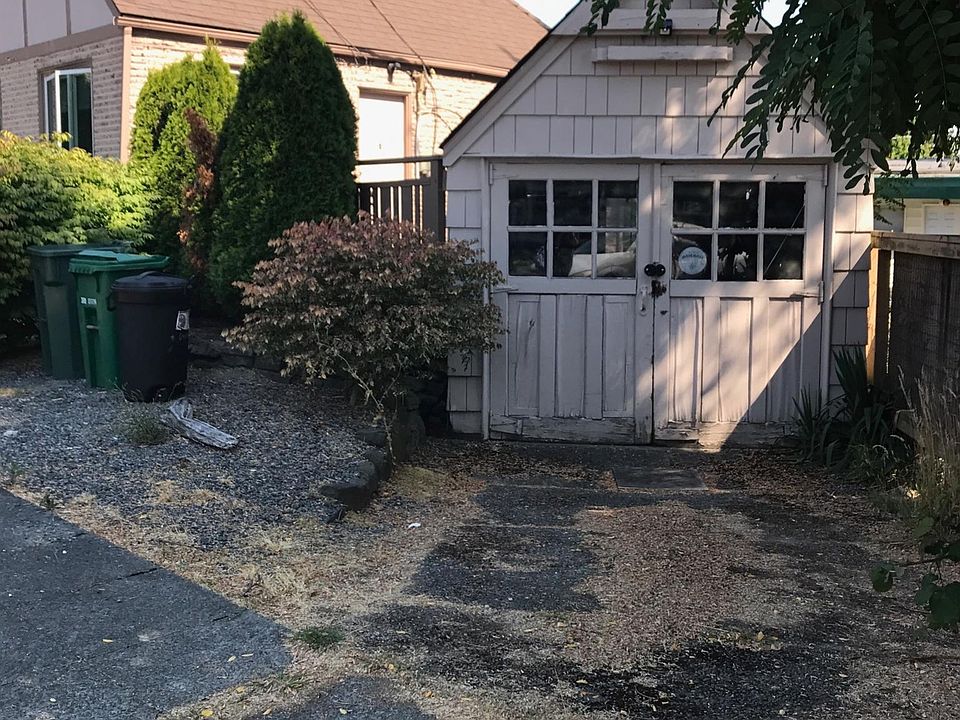 Detached garage and off street parking shared with lower unit