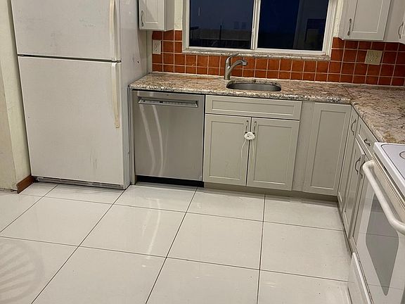 New cabinetry, new floor, granite overtop.