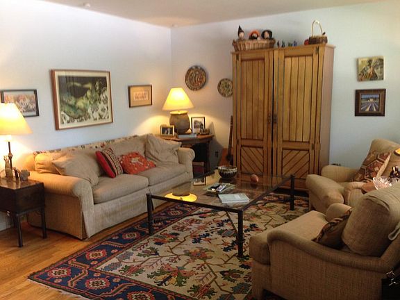 Cozy south facing living room, hardwood floors