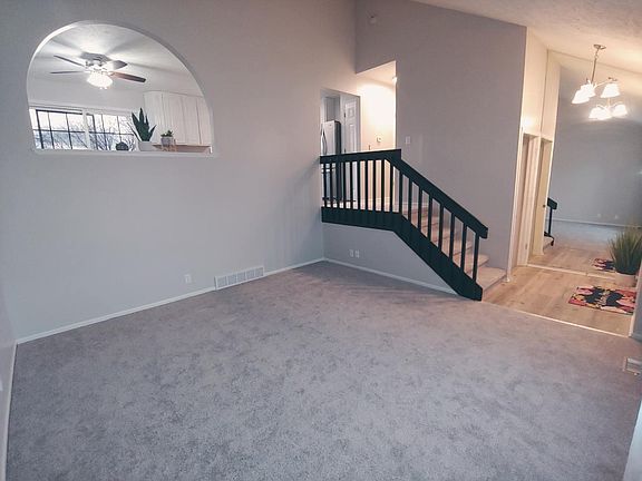 Living room. Mirrored entryway.