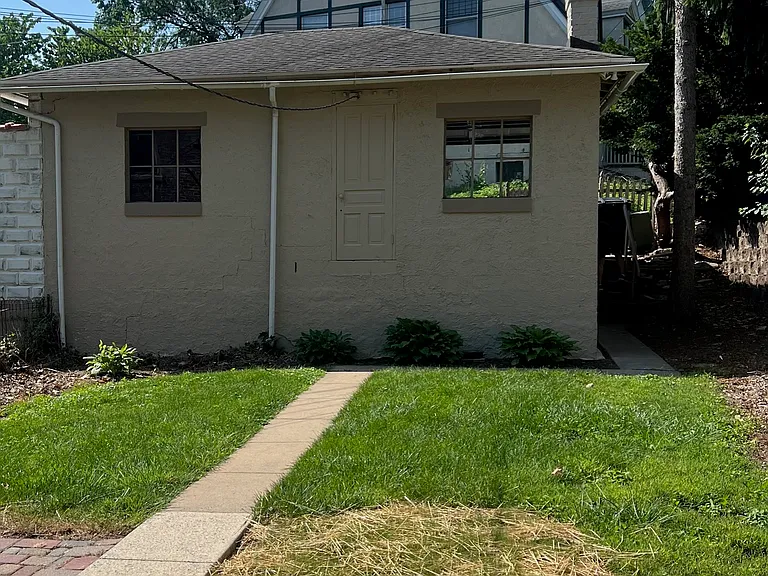 One bay of garage is included with Apt. 1.