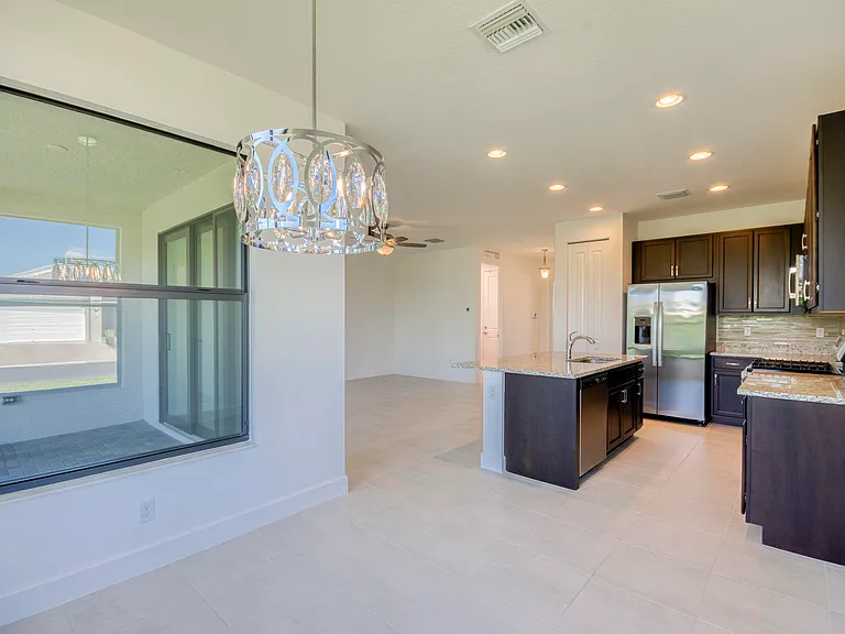 12555 SW Manatee Marsh Ter — Photo 12
