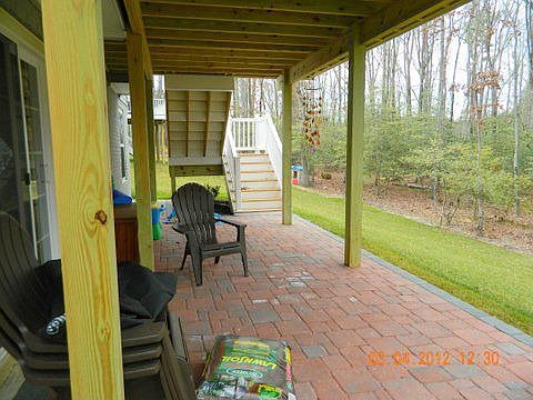 Patio Under Screened In Deck