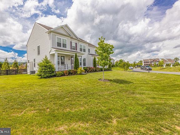 front of home on nearly half acre lot