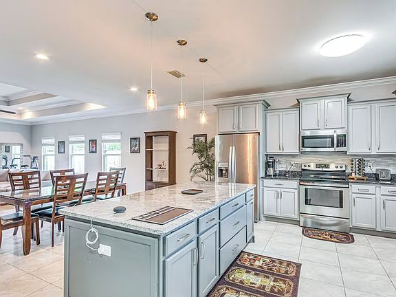 Walk through the front door and be greeted by this beautiful, open interior