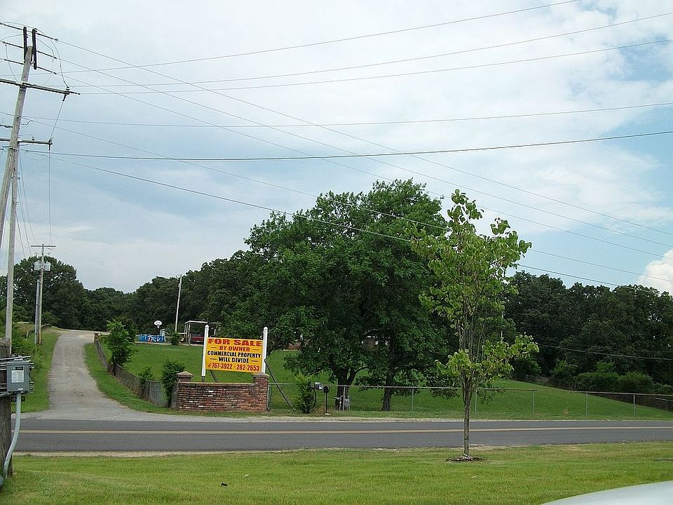 6.5 Acres 2 houses & shop.