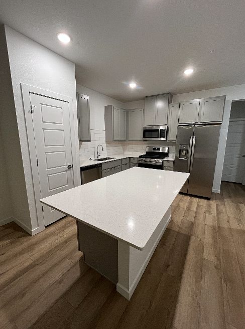 Full Pantry and kitchen island w bar stool seating