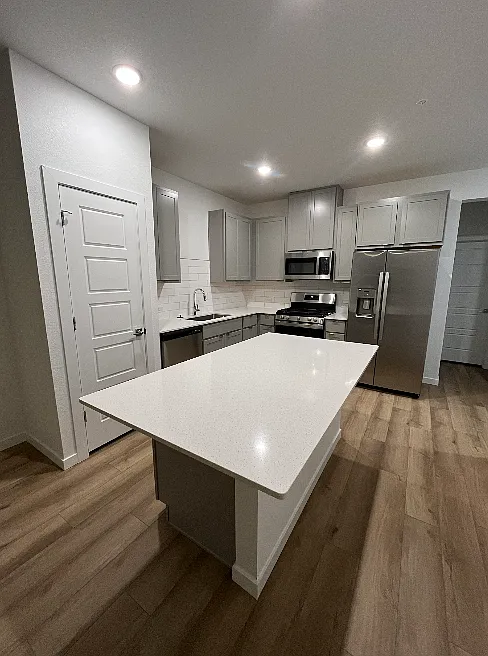 Full Pantry and kitchen island w bar stool seating