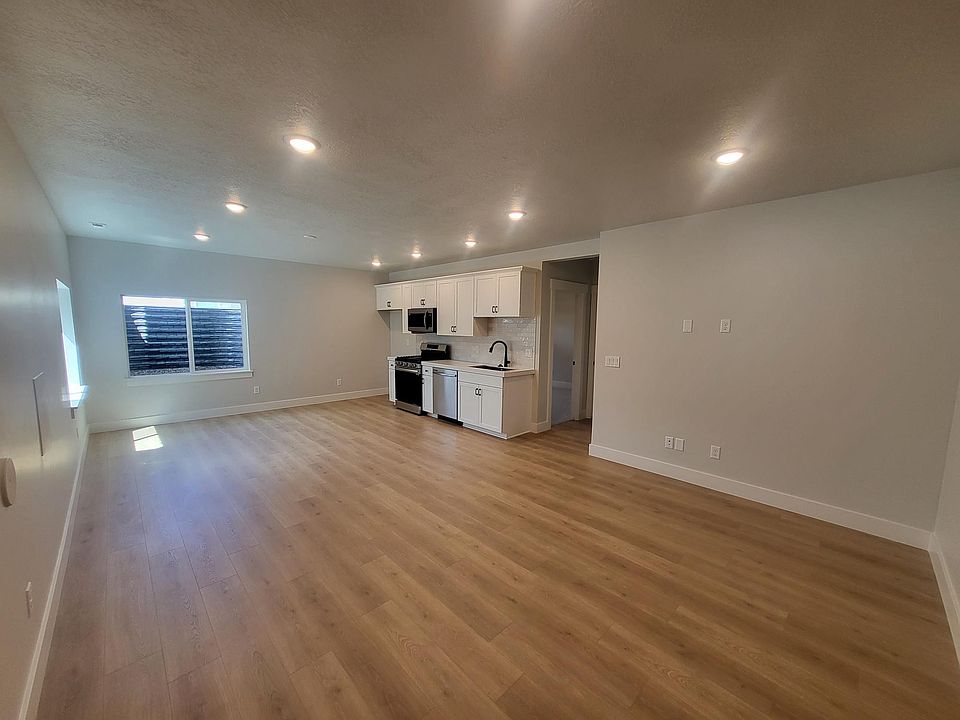 open family room with kitchen all new appliances except refrigerator.