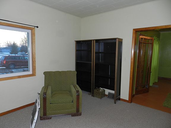 Living room -- chair and bookshelf stay
