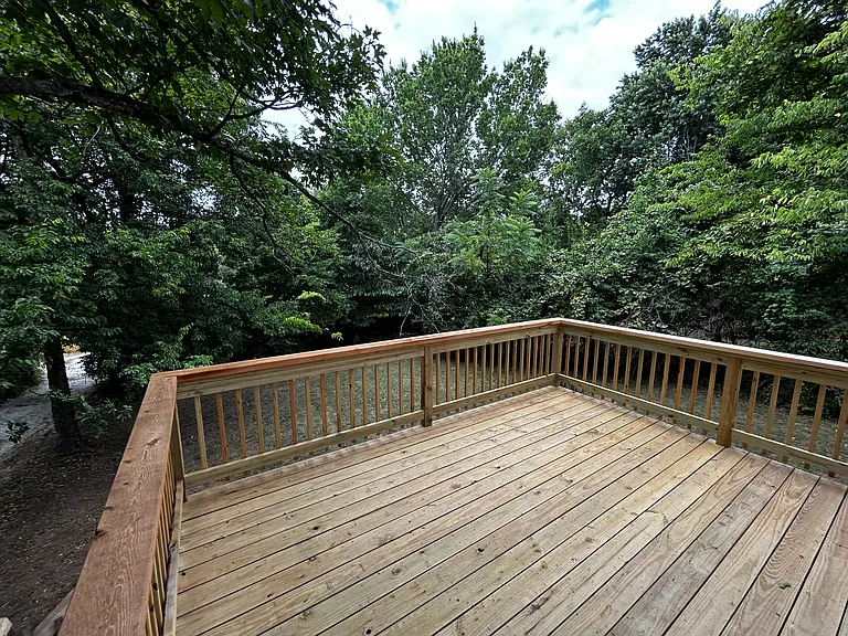 Brand new spacious deck off kitchen