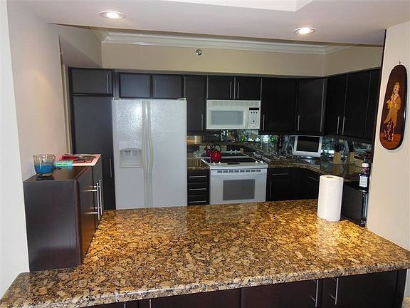 5th image of 3600 Mystic Pt Dr APT 710