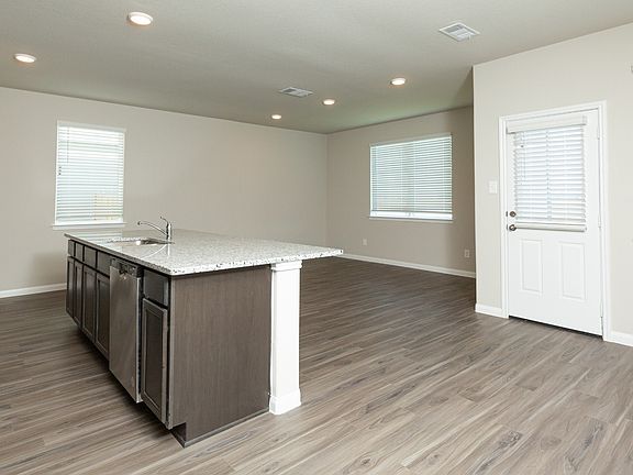 Dining Area to Kitchen and Family Room