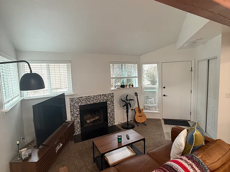 For illustration purposes only: living room view showing fireplace and entrance.
~ Furniture not included ~