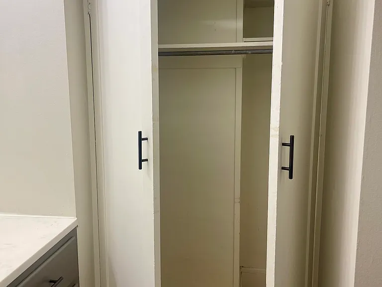Large Primary Closet with Ample Storage Large Primary Closet with Ample Storage