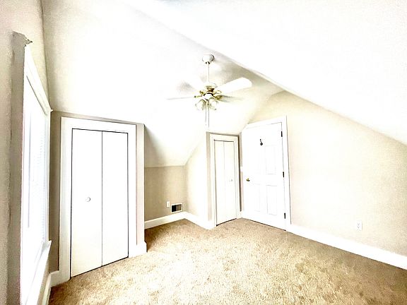 Smallest bedroom with two small closets and one window to west side.
This can be a small office.