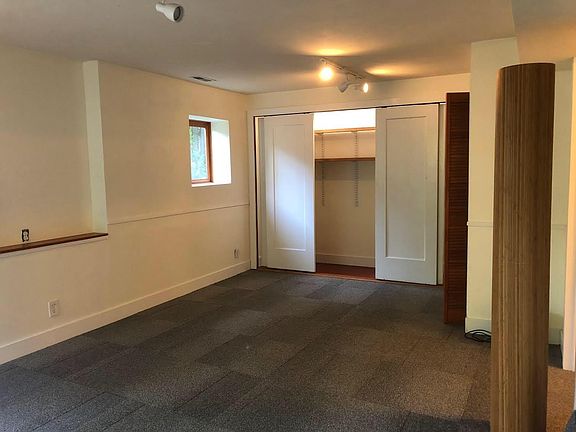 Studio looking from entry. Large closets