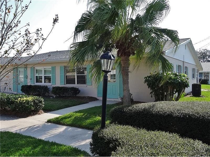 One-level, corner unit right next to the mailboxes includes one covered parking space.