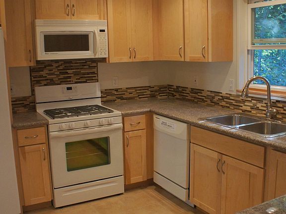 new cabinets, granite, tile