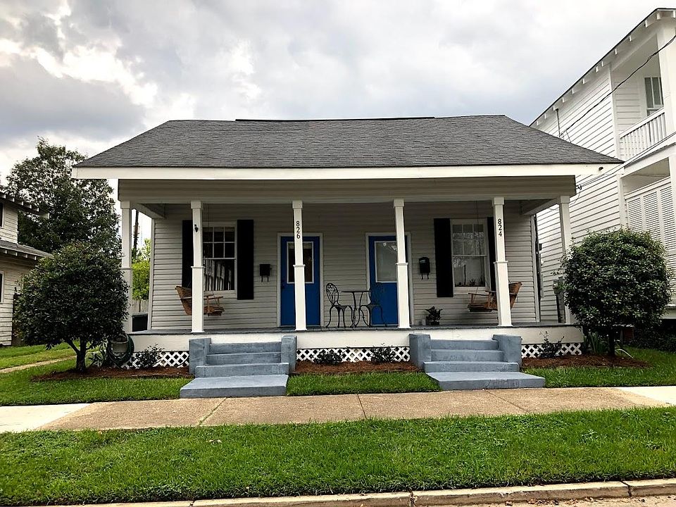 Front view of 824 and 826 N 6TH St. Each unit of the duplex has a handmade cypress porch swing and views of the State Capitol.