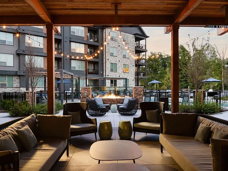 Courtyard with lounge seating and fireplace