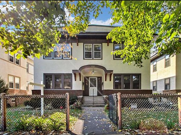 Quiet, classic fourplex in the Lyndale neighborhood. Fenced in front yard with rain garden and patio seating.