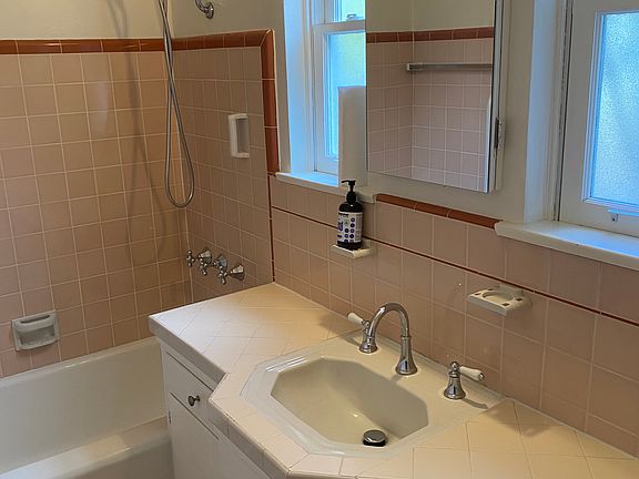 Tile floor and walls.