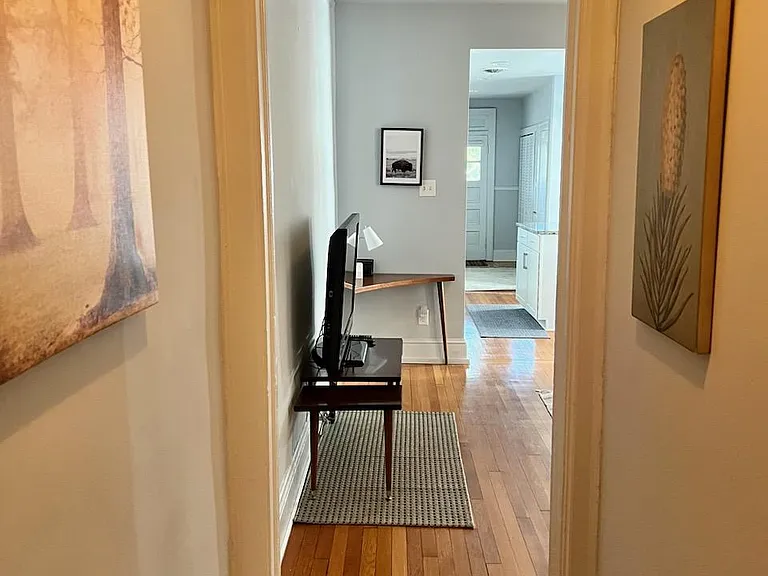Cozy front entry with warm hardwood floors.