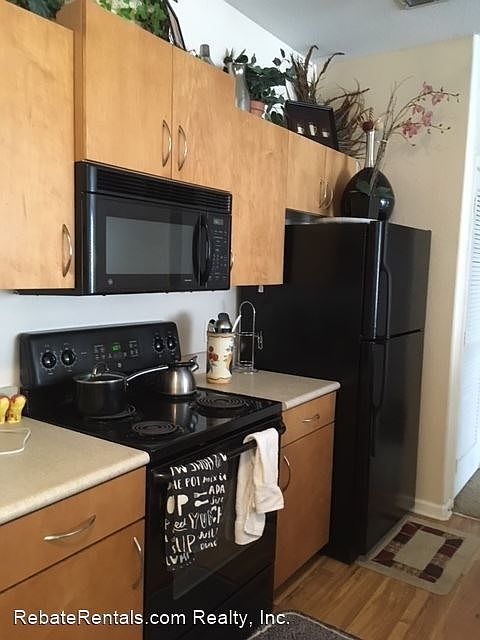 1st image of 8290 Gate Pkwy W Unit 406
