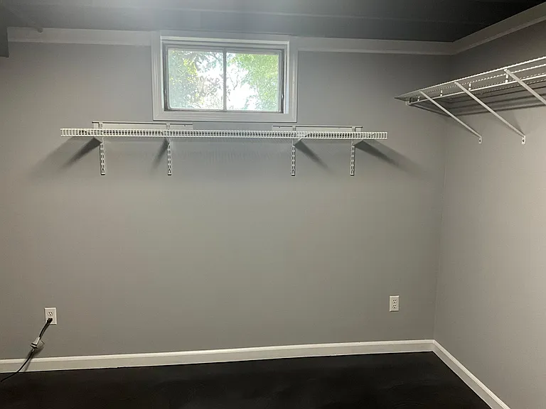 Lower level walk in closet/storage