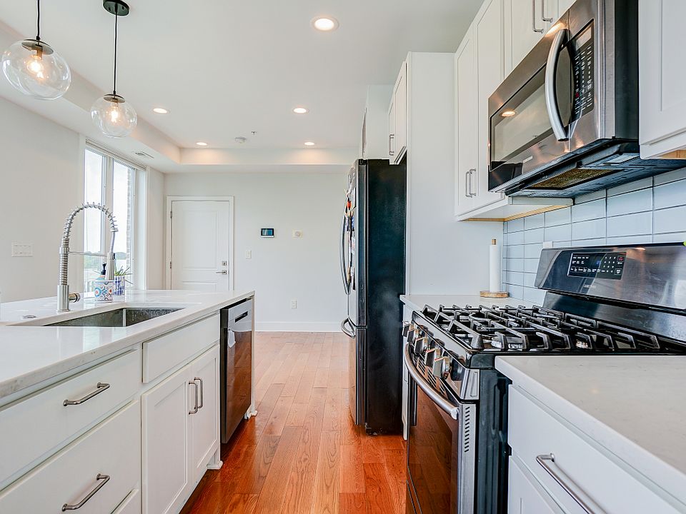 Sun Drenched Kitchen, Living Room and Dining Area