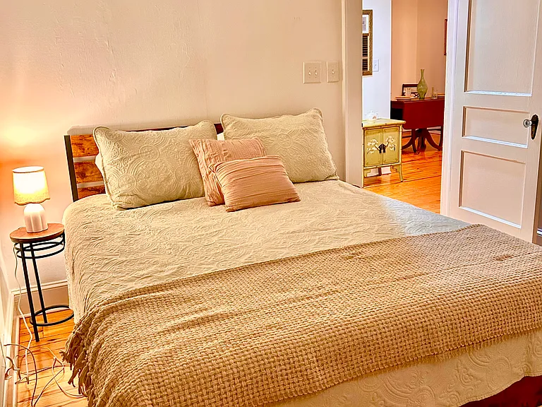 Master bedroom with double closet and queen size bed