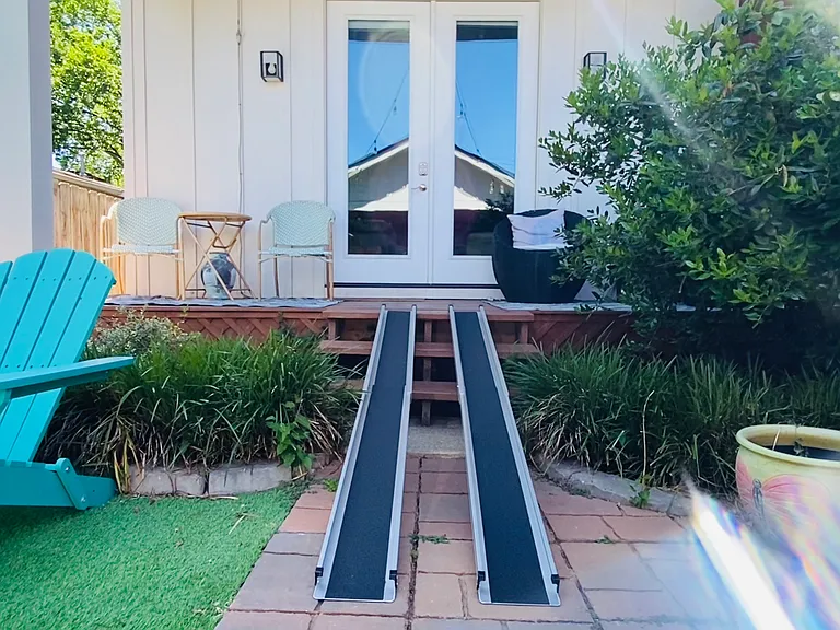 Accessibility matters. A portable wheelchair ramp is available upon request, making entry to the home and access to the main-floor bedroom and full bathroom more convenient.